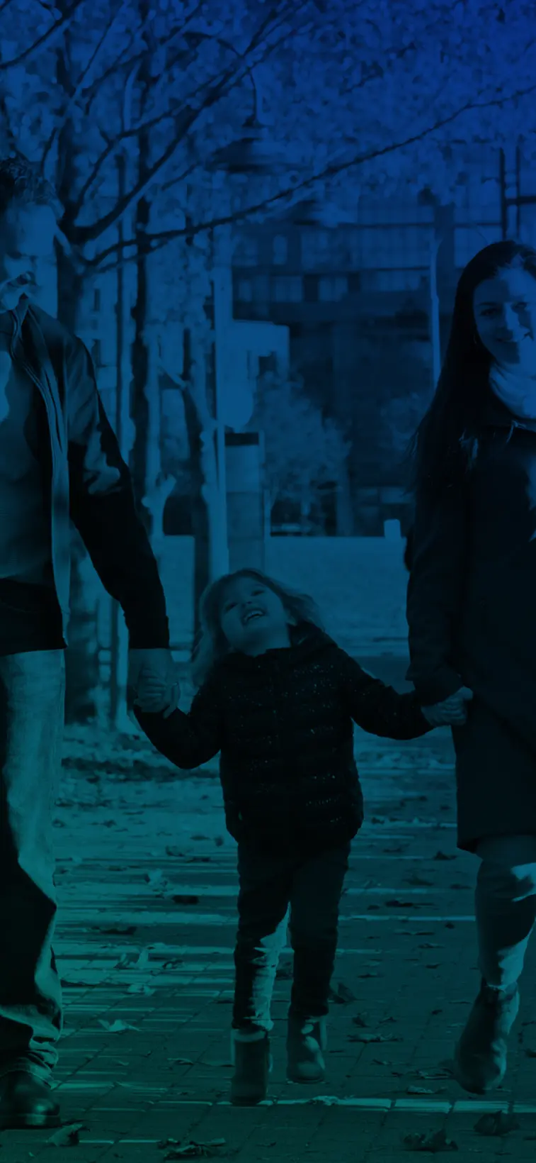 A photo of a happy family walking